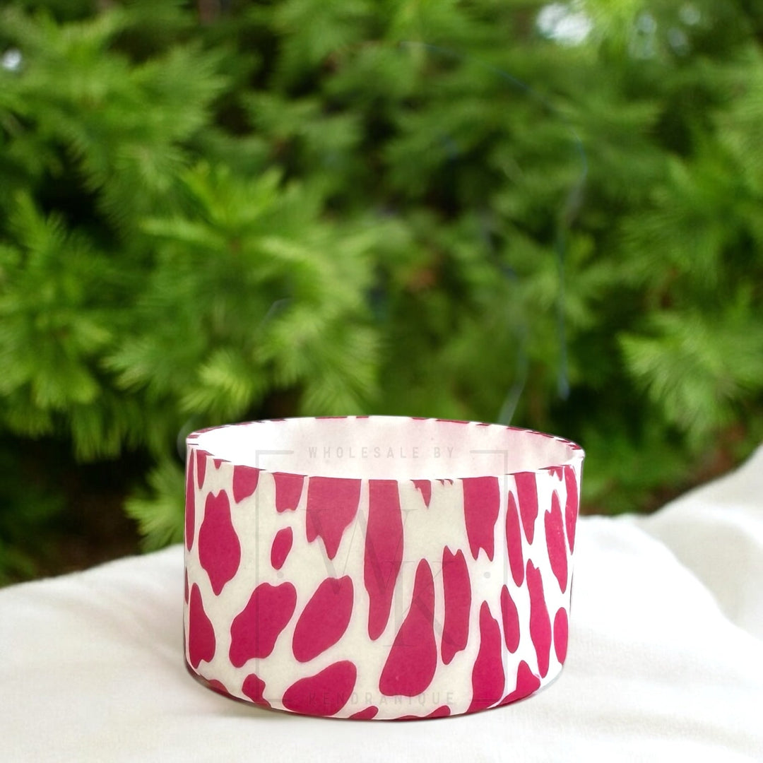 Silicone (cow print-pink) tumbler boot for popular 40 oz tumblers and glass cans